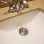 3rd image of Bathroom Sink/Bathtub Hair Catcher & Drain Protector in Brushed Nickel